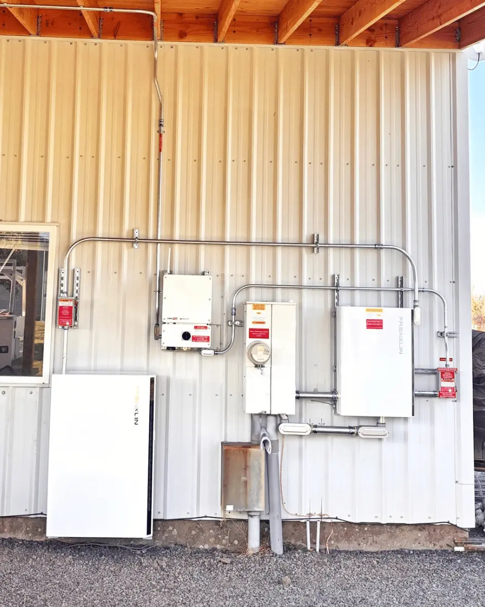 FranklinWH battery backup system installed on exterior of metal barn in rural Joseph, Oregon.